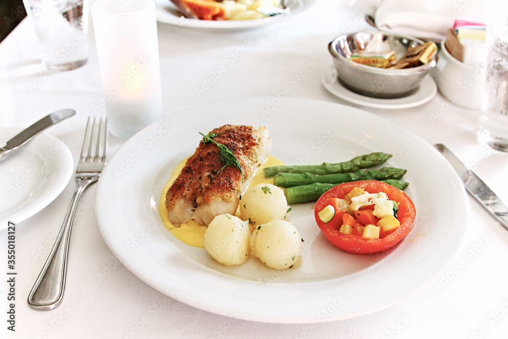 Romantic dinner. Fish with asparagus. Romantic dinner. Fish with asparagus.