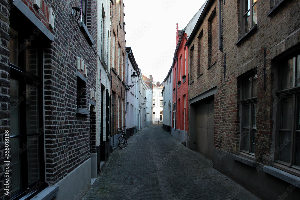 A narrow walkway between Old Town buildings.