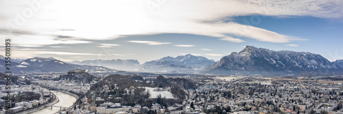 Panoramic aerial drone shot view of Salzburg aiglhof station with view of eastern bavarian alps mountain