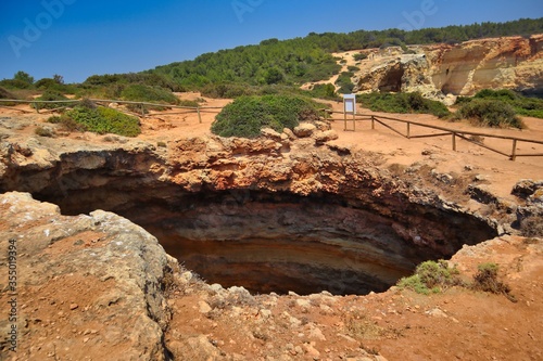 Benagil Cave Top View in Carvoeiro. Cave Hole from Above in Algarve Coast.