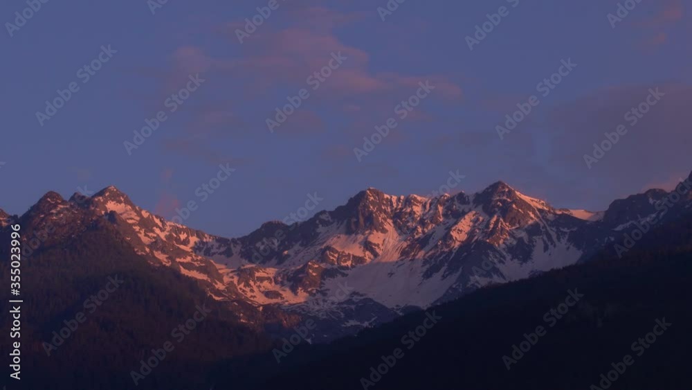 Spectacular sunset over the snowy peaks on the Italian Alps. 4K Spectacular sunset over the snowy peaks on the Italian Alps. 4K