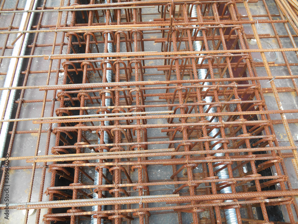 Hot-rolled deformed steel bars or steel reinforcement bar tied together before casting in the concrete. Its function is to increase the concrete strength. Hot-rolled deformed steel bars or steel reinforcement bar tied together before casting in the concrete. Its function is to increase the concrete strength.