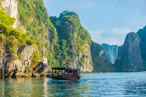 HA LONG BAY, VIETNAM, JANUARY 6 2020: boat in the beautiful Ha long bay