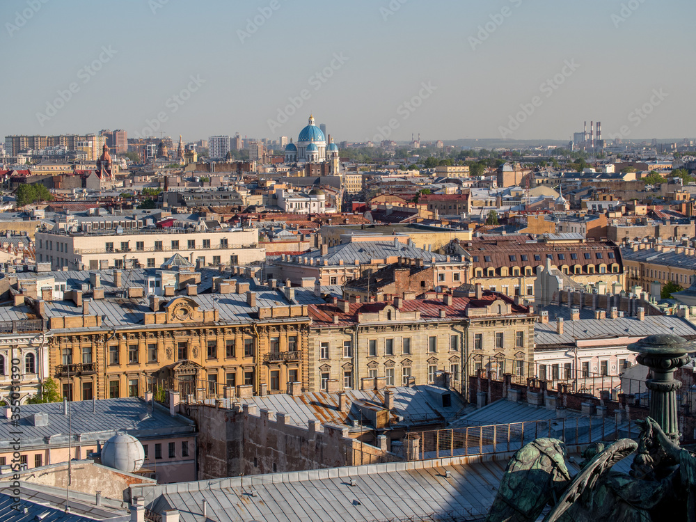 Famous roofs of Saint Petersburg on a clear summer day. On the horizon of the dome of the Church.