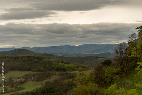 Remote locations for visiting are the best to relax in the nature. View from the top of the mountains with sky covered by a clouds in a sunny day.  © Dimitar