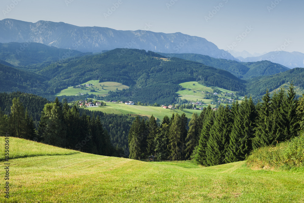 Panoramic view of the mountains and green areas of Weyregg am Attersee district town of Vöcklabruck in Austria.