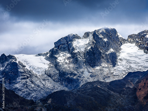 Snow Peak Mountain Rock with a Dramatic Sky in Cordillera Blanca, Peru, South America