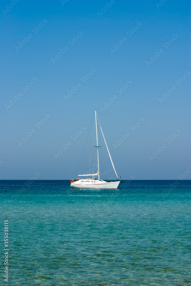 Yacht, calm sea, clear sky. Idyll.