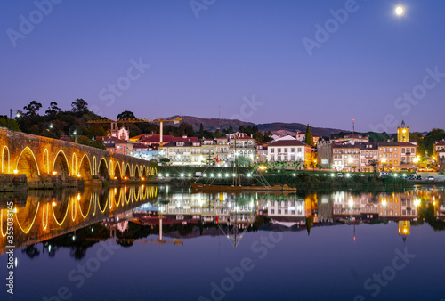 night view of historic village of ponte de lima portugal photo