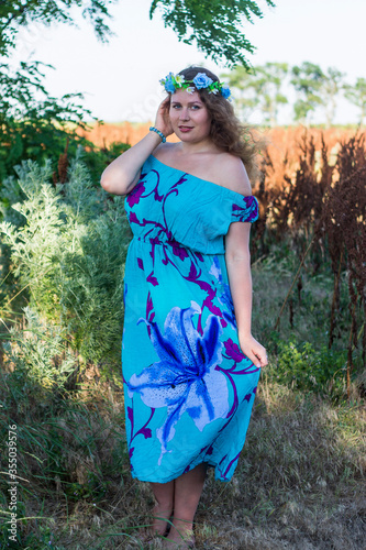 young plus size woman in a dress