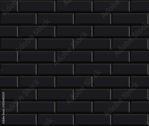 Black brick wall. Long brick tile pattern.