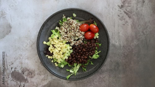 Serving Black Bean Quinoa Salad photo