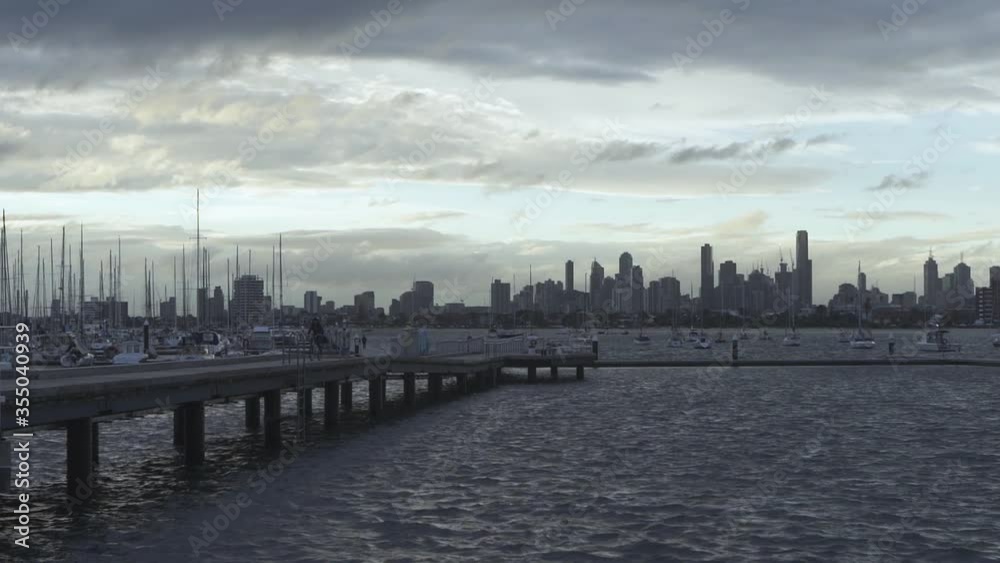 At the pier overlooking the city during sunset (slow motion 120fps) At the pier overlooking the city during sunset (slow motion 120fps)