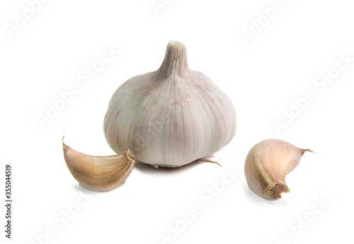 garlic with two slices on a white background