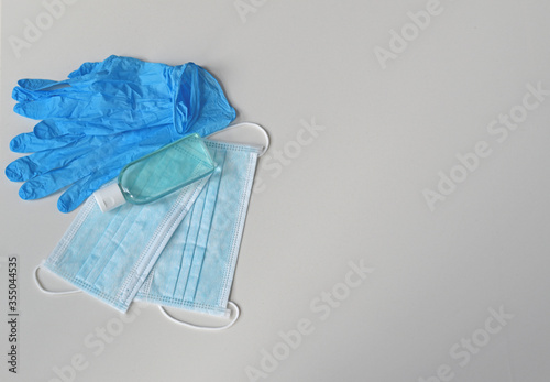Covid-19 prevention set of gloves, surgical masks and hand sanitizer, coronavirus prevention concept
