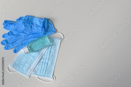 Covid-19 prevention set of gloves, surgical masks and hand sanitizer, coronavirus prevention concept