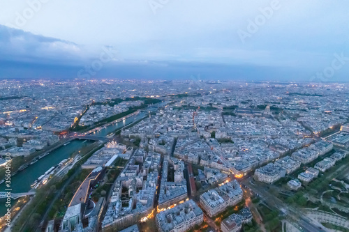 Panorama of Paris in the evening from the height of bird flight at sunset