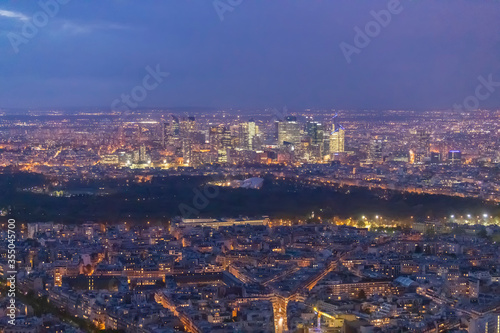 Panorama of Paris in the evening from the height of bird flight at sunset © max