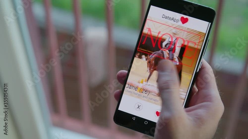 Left swipe big nope to women on smartphone dating app 4K