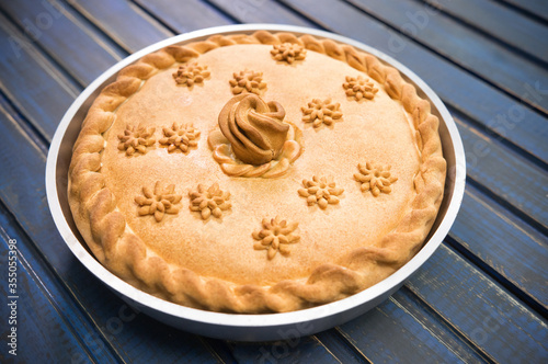 Sweet Potato Pie with edible decorations on top