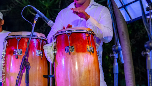 Cuban musician playing drums on the stage, Havana, Cuba. © Daniel Avram