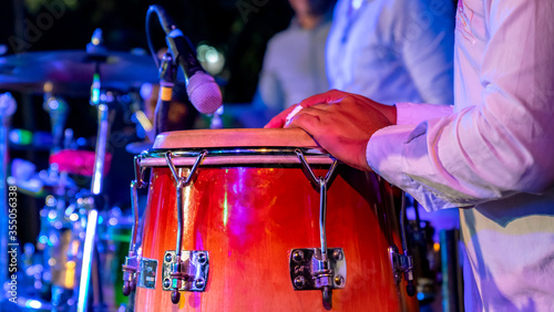 Photography Cuban musician playing drums on the stage, Havana, Cuba.