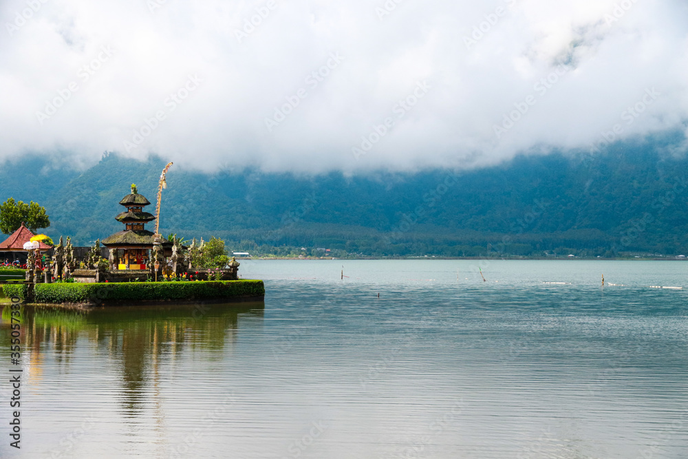 Fototapeta premium Pura Ulun Danu Bratan, Hindu temple on Bratan lake landscape, one of famous tourist attraction in Bali, Indonesia