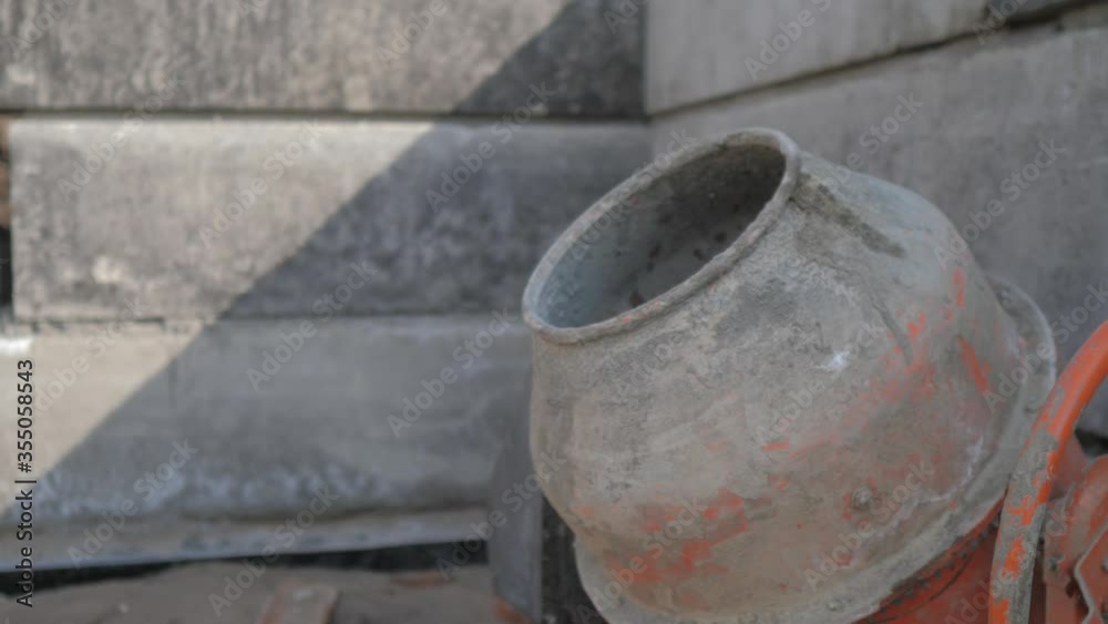 Industrial cement mixer machine a construction site. concept building constructing architect concrete pouring. Mixes the sand, lifestyle gravel and water