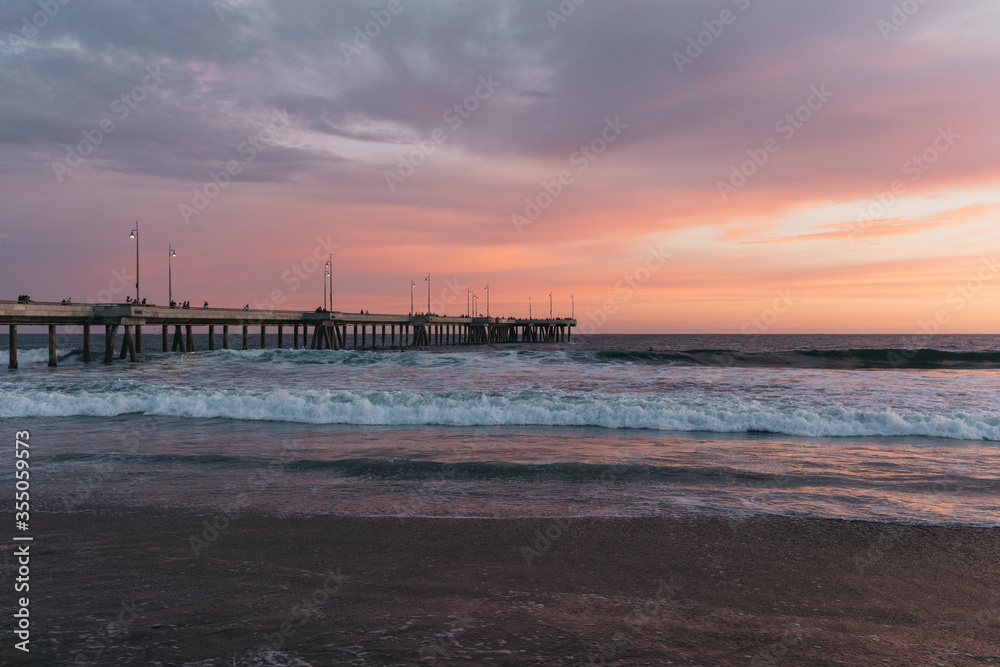 Colorful sunset at pier of Venice Beach, California