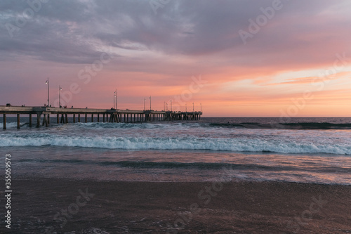 Colorful sunset at pier of Venice Beach, California