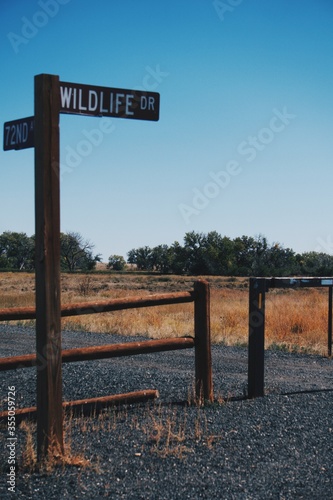 wooden sign on the beach