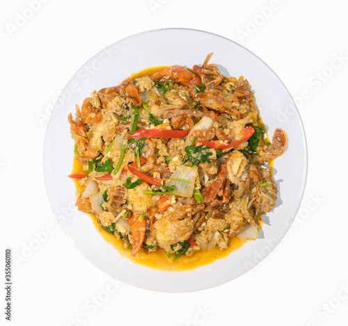 Stir Fried soft shell crab yellow curry powder ingredients it is the favorite delicious Thai, Chinese seafood of Thailand. Top view on white background