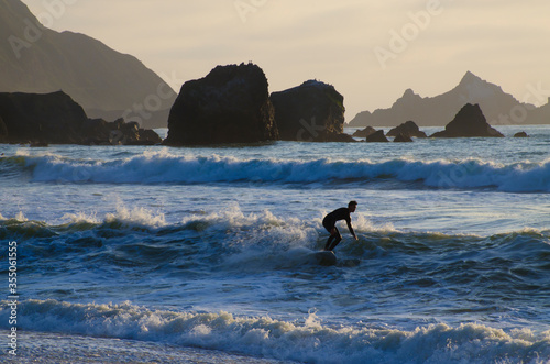 Surfing Rockaway Beach, Pacifica, California, USA