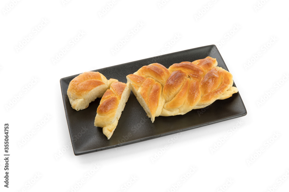 slices of egg bread on a black plate isolated on white
slices of egg bread on a black plate isolated on white