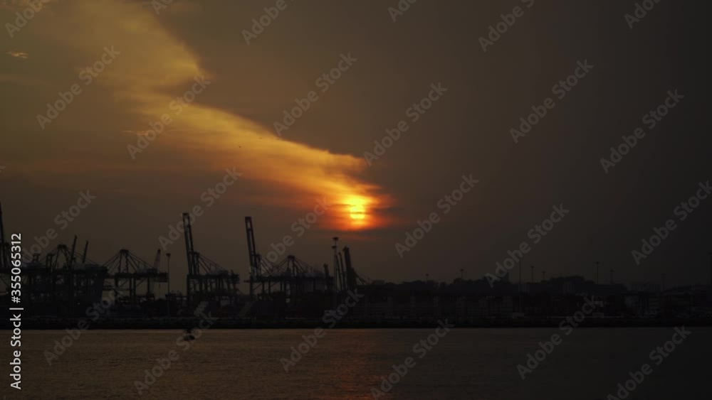 Cloudy sunset at the cargo pier (slow motion 120fps) Cloudy sunset at the cargo pier (slow motion 120fps)