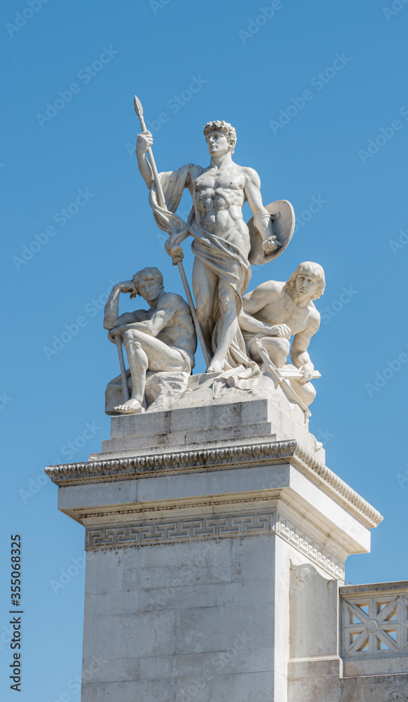 Obraz premium sculpture The Force near Victor Emmanuel II National Monument in Rome. Man with a spear and shield