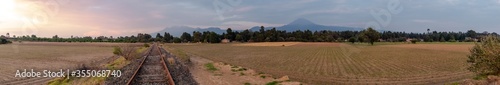 Scene from the Iztaczihuatl and Popocatepetl volcano On a summer sunset