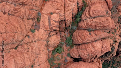 Aerial flying over the red rock of Hellhole Canyon. Ivins, Utah, USA photo