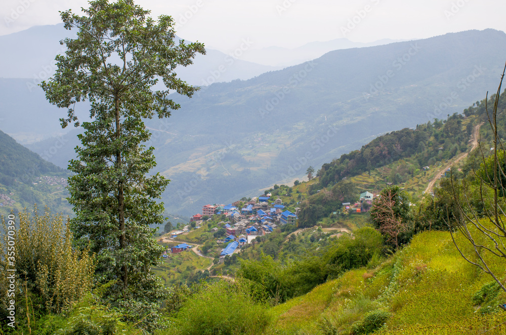 Fototapeta premium Landscape village in the mountains of Nepal Himalayas 