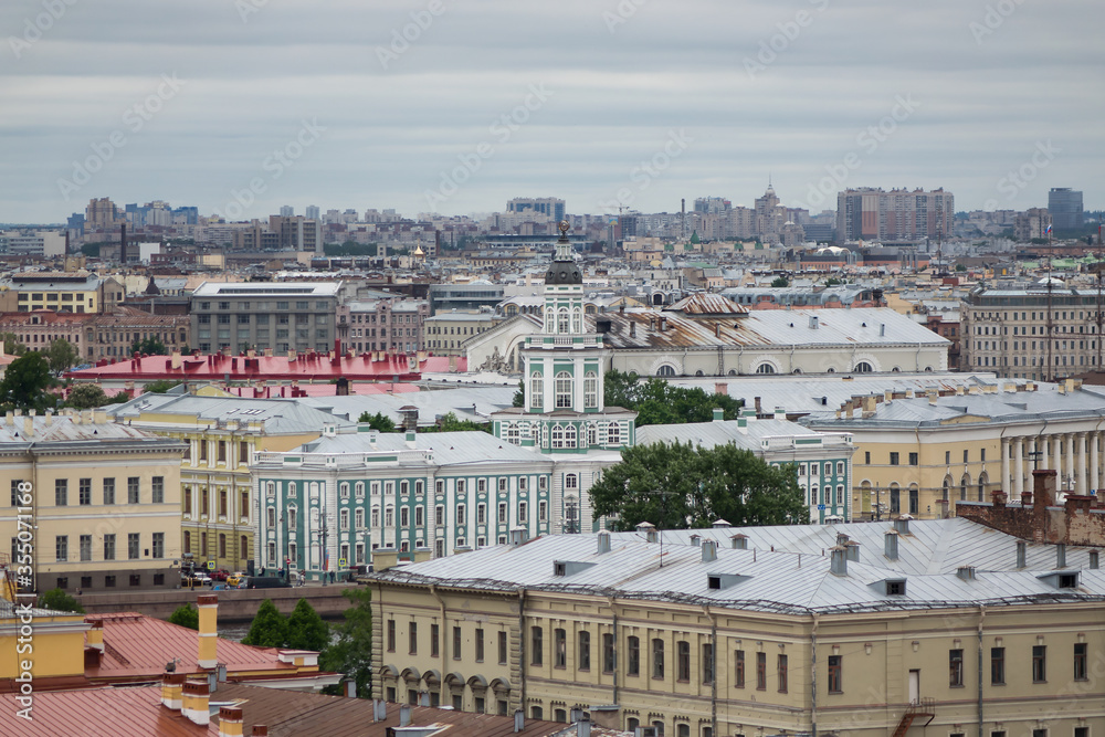 View on Saint Petersburgs' roofs from a cathedral height. Saint Petersburg in different directions. Kunstkamera