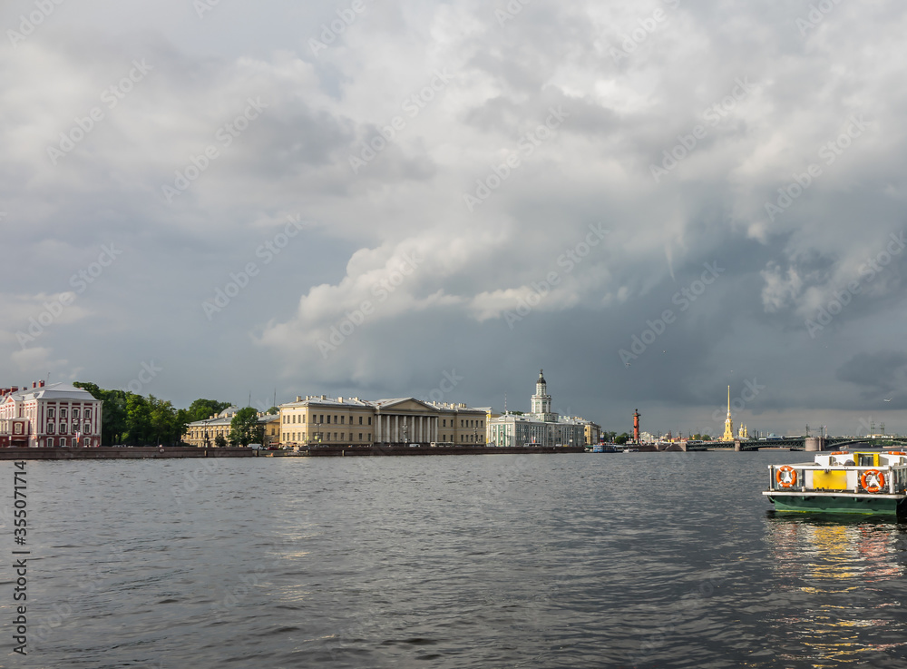 View on Saint Petersburg's embankments riverbanks from a boat in the evening View on Saint Petersburg's embankments riverbanks from a boat in the evening