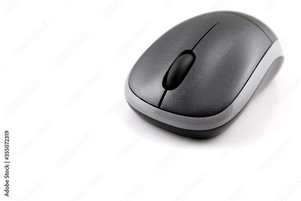 Side view of wireless computer mouse isolated with white background Side view of wireless computer mouse isolated with white background