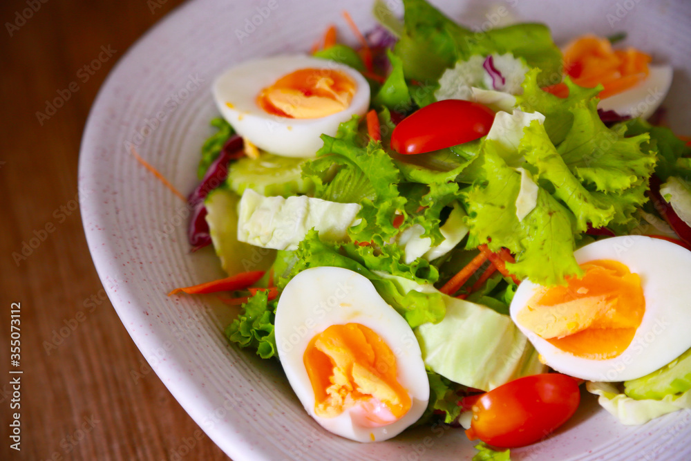 Fresh salad with fruit in breakfast for clean and healthy food. Salad in top view and empty area for text.