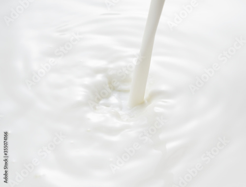 Close up of the milk pouring