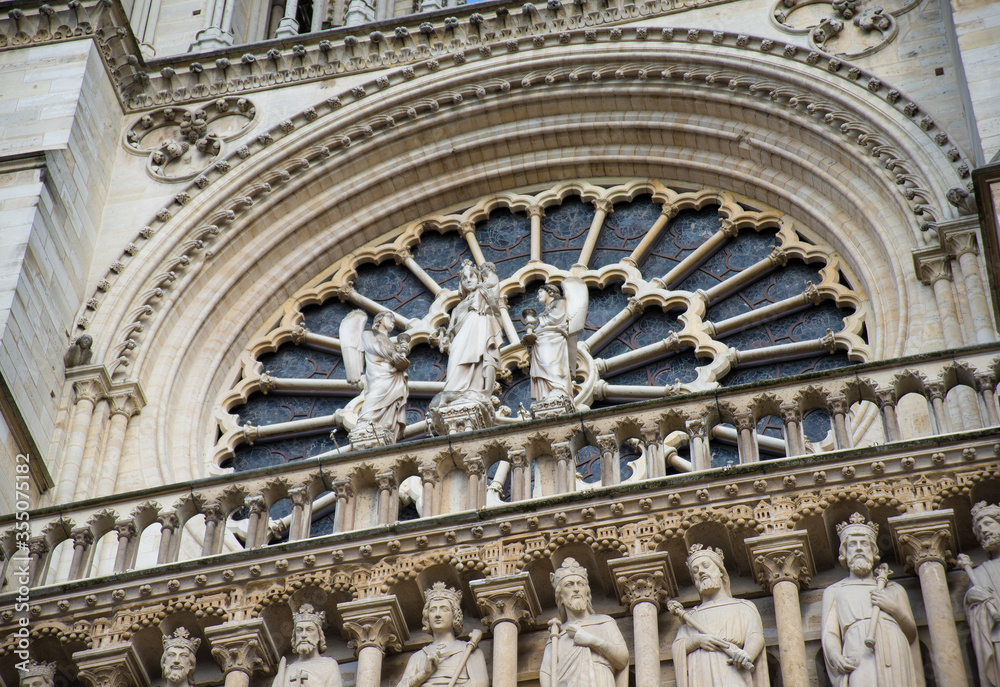 Notre Dame de Paris in a beautiful summer day. Close up onto huge rose window
