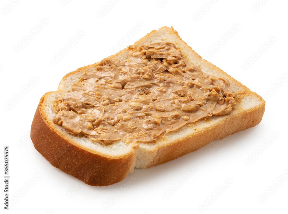 Peanut buttered bread placed on a white background.
