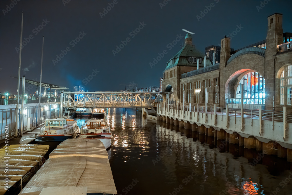 A small dock at night with colored lights in Hamburg
