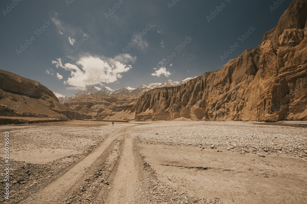 Upper mustang - Kingdom of Lo. Canyon in ancient Tibet. Sandstone massif in Nepal. trekking rote. high quality photo. Anapurna area. wild place.close territory.