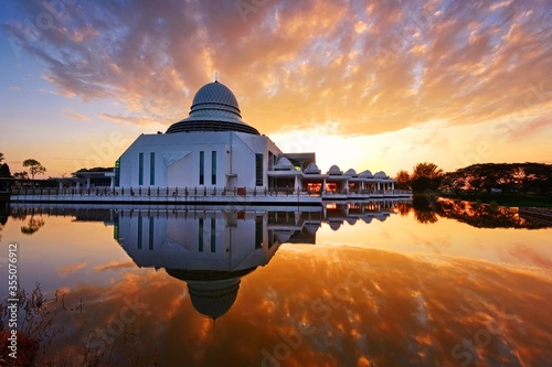 Beautiful sunrise reflections over the mosque in Perak, Malaysia