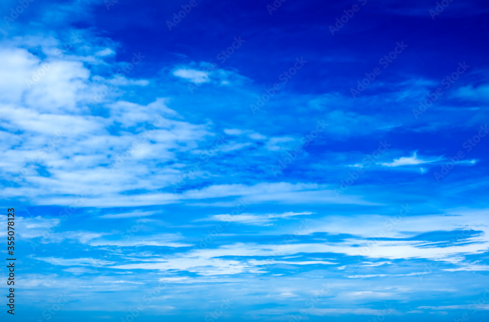 White clouds in the blue sky for the background